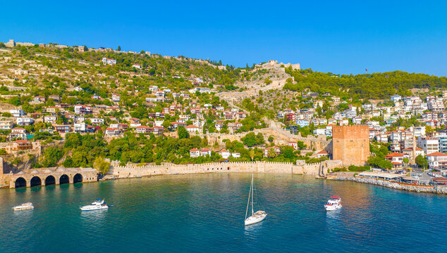 Alanya - Turkey, August 11, 2023, An aerial view of the bay Alanya in Antalya Turkey. Sea and city with an open sky. Kizil Kule - Alanya