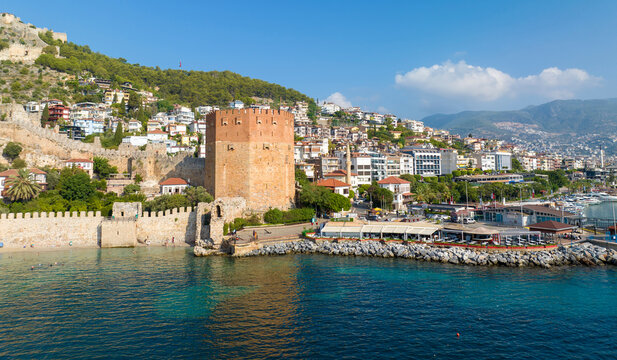 Alanya - Turkey, August 11, 2023, An aerial view of the bay Alanya in Antalya Turkey. Sea and city with an open sky. Kizil Kule - Alanya
