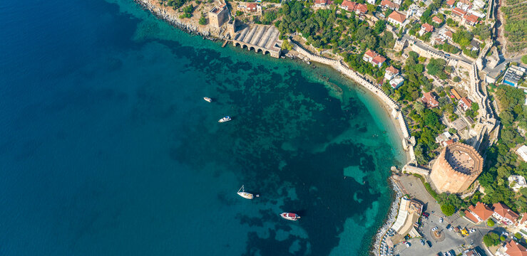 Alanya - Turkey, August 11, 2023, An aerial view of the bay Alanya in Antalya Turkey. Sea and city with an open sky. Kizil Kule - Alanya