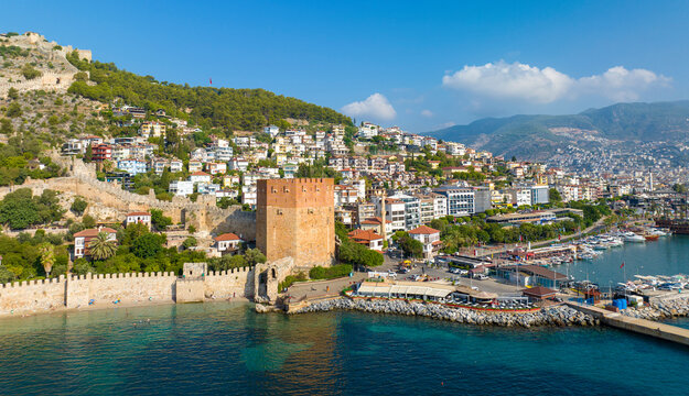 Alanya - Turkey, August 11, 2023, An aerial view of the bay Alanya in Antalya Turkey. Sea and city with an open sky. Kizil Kule - Alanya