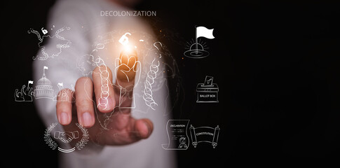 Decolonization concept. Finger touches a fist icon with a broken chain and an open lock. Global liberation, national sovereignty, independence, freedom, sovereignty, declaration, and democracy