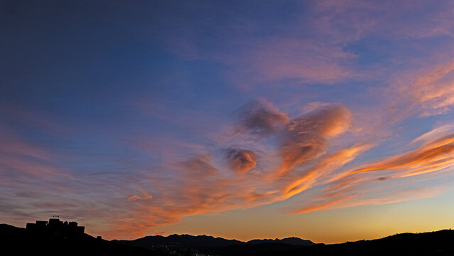 Dramatic sunset over the Castle of Alora in the Guadalhorce valley in Southern Spain. 
