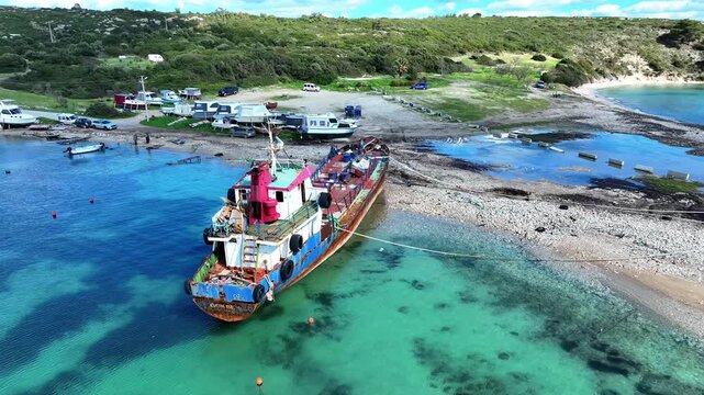 Stranded Cargo Ship on Shore &ndash; Aerial Drone View of Grounded Vessel Near Coastline
