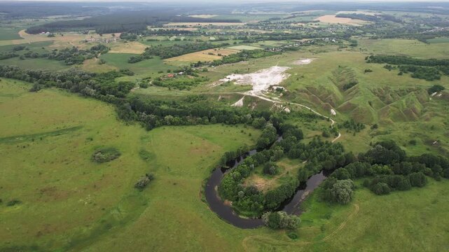 Aerial View of Chalk Quarry and Meandering River near Mohrytsia Village, Sumy Region, Ukraine