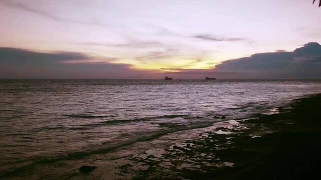 Beautiful Purple and Orange Twilight Sky Over the Coastline of Biak, Indonesia.