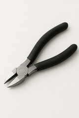 Obraz premium Black handled needle nose pliers tool.