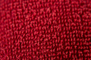 Detailed Macro Shot of Red Fabric Pattern Isolated