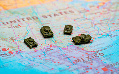 Naklejka premium Military patrol and border security on USA Mexico map.