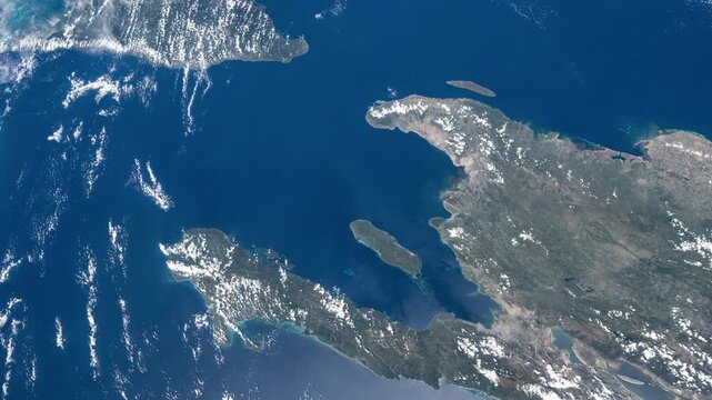 Rotating flying over Haiti Hispaniola Caribbean Sea satellite view from space based on Nasa imagery