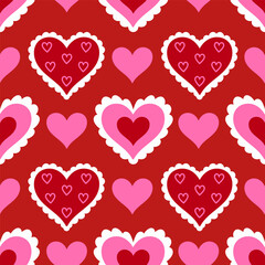 Seamless pattern with pink and red hearts with ruffles. Vector graphics.