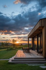 Fototapeta premium From a charming wooden deck, soak in the breathtaking sunset that paints the sky in vibrant colors, as lush green hills stretch endlessly in this serene rural landscape
