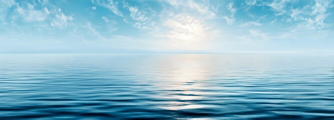 Fototapeta premium Sky and Sea Harmony: A tranquil scene where the sky's vastness mirrors the sea's serenity, reflecting the soft glow of sunlight to create a peaceful atmosphere. 