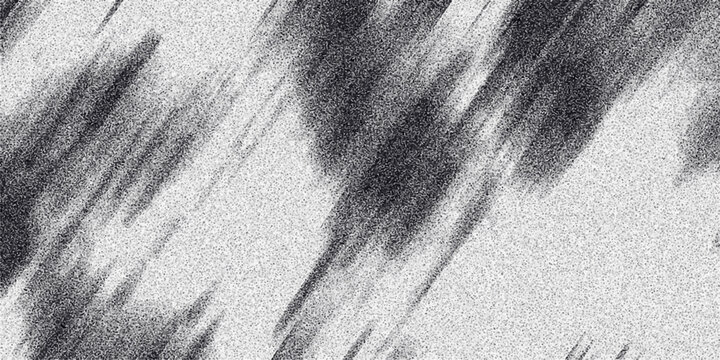 Abstract monochrome grainy texture with diagonal dark smudges and speckled white background creating a dynamic, textured visual effect for graphic design and backgrounds