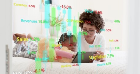 Fototapeta premium Watching mom wearing glasses white-tee, daughter pink-top on bed viewing tablet with teddy HUD