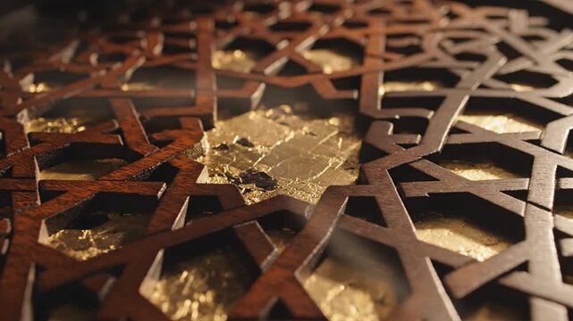 Close up of a decorative metallic clock face with intricate Roman numerals and reflective surface illustrating time and craftsmanship