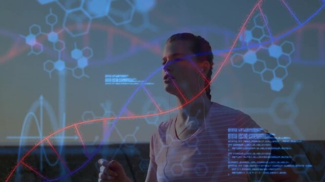 Woman running activating armband sending live data, DNA helix and graph overlays tracking fitness