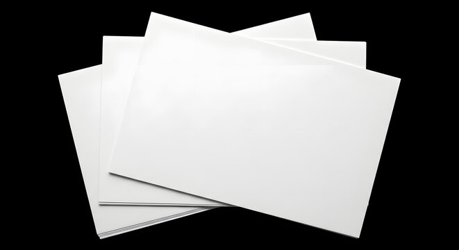 A stack of blank white papers on a black background, ready for use.