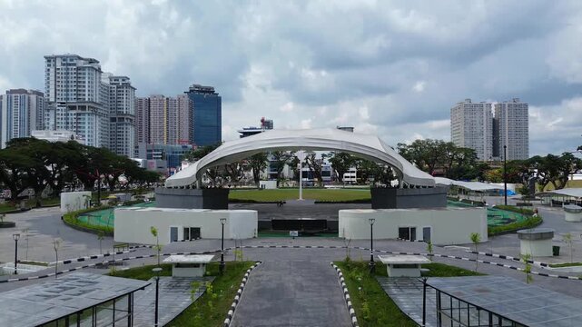 Modern urban skyline and city center buildings at Lapangan Merdeka in Medan Indonesia aerial