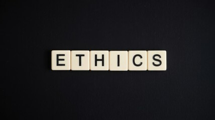 The important word 'ETHICS' is clearly spelled out using white scrabble tiles.