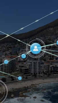 Vertical video: Central network node appearing sending lines, nodes showing data flow over coast