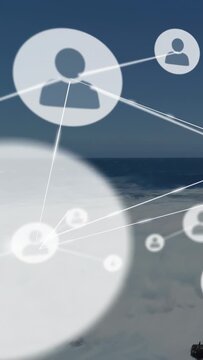 Vertical video: Nodes fading in from right, moving over sea, scaling and linking, showing network