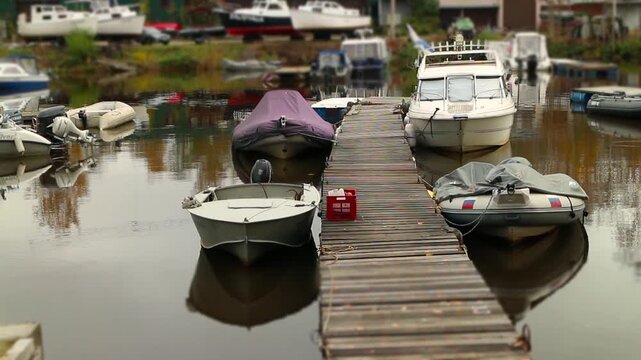 view of the motorboat pier with moored vessels