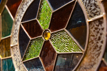 Detailed Close-up of Geometric Stained Glass Art with Star Pattern