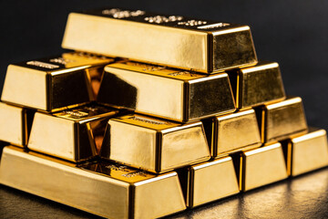 Wealthy Investment Display Featuring Polished Gold Bars Arranged In Pyramid Within Secure Vault © Artoym