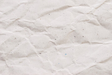 Obraz premium A sheet of a creased recycled subtle paper texture as background