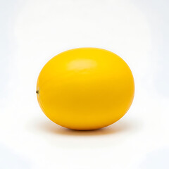 A vibrant yellow canary melon isolated on a clean white background, studio shot