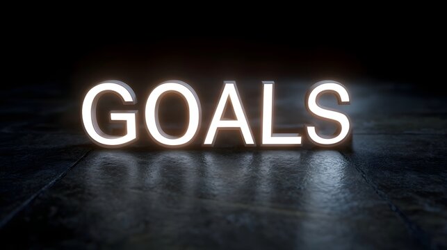 GOALS text glowing brightly in white set against a dramatic dark background with reflective textured floor signifying aspi ns