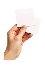 Obraz premium A hand holding two blank white squares perfect for mockups on transparent background