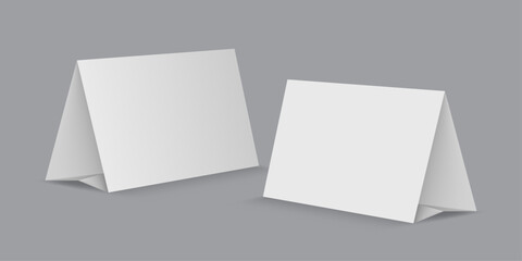 Table tent A5 mockup for showcasing products. Promotional setup for showcasing product or designs.  © Margarita 