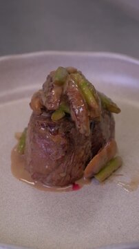 Recipe, hands and meat in kitchen for cooking dinner, meal preparation and sear beef cuisine. Chef, person and steak with herbs for healthy ingredients, nutrition and lunch food in home. 