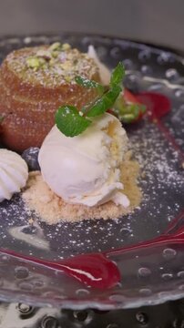 Delicious Chocolate Lava Cake souffle with Powdered Sugar and ice cream kitchen preparation High quality FullHD footage
