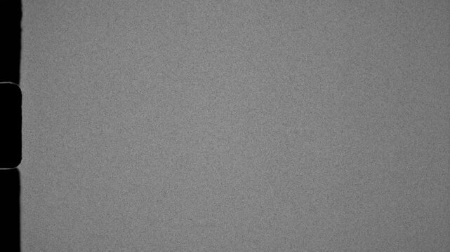 Vintage Super 8 film sprocket frame overlay with analog grain and flicker texture