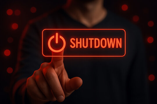Finger pressing glowing shutdown button with futuristic digital concept representing control power system privacy safety and technology use