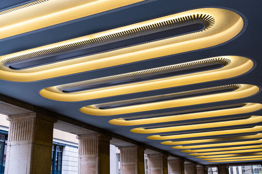 Ceiling lighting at Altmarkt Karree in Dresden. Indirect concealed illumination from the GDR era, architectural interior detail from East German modernism.