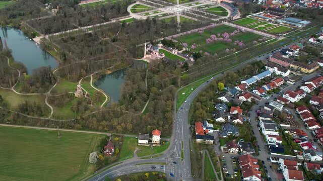 An panoramic aerial view beside the old town an palace of the city Schwetzingen in Germany on a sunny early spring morning during the cherry blossom season.