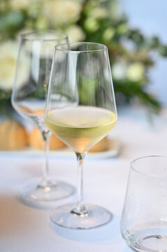 Elegant White Wine Glass on a Dining Table