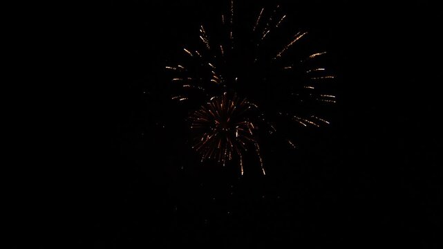 firework sky 2024. christmas. shining colorful golden firework sky. background glowing display new year. multicolor blur night. eve christmas. celebration fireworks. show real happy fortunate lights
