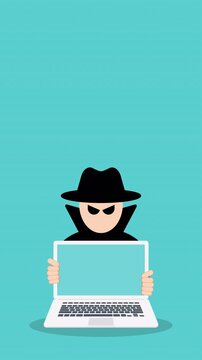 Anonymous hacker in front of his computer