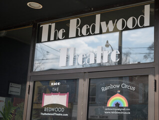 Obraz premium exterior building entrance and sign of The Redwood Theatre, a concert hall, located at 1300 Gerrard St E, Toronto