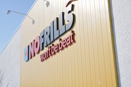 exterior wall and sign of Ryan's NOFRILLS East York a grocery store chain, located at 1150 Victoria Park A, Toronto