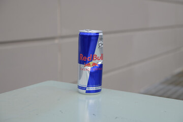 Naklejka premium dented discarded can of Redbull energy beverage in Toronto