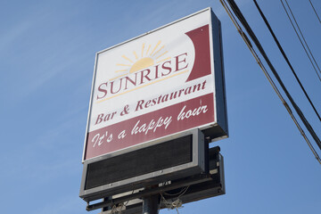 Naklejka premium road side pylon sign of Sunrise Bar & Grill located at 1416 Victoria Park Av, North York, Toronto