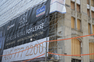 Naklejka premium redevelopment of former Maclean-Hunter Publishing Co building, now The United Condos at 480 University Av incl banner for lease info, Toronto
