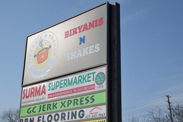 Obraz premium road side pylon business directory at Victoria Supermarket, incl Biryanis N Shakes, a restaurant, 1410 Victoria Park Av, Toronto