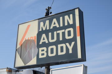 Obraz premium road side pylon ghost sign of Main Auto Body (officially Main Auto Body Limited), located at 1408 Victoria Park Av, Toronto