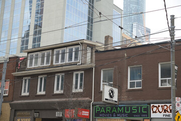 Naklejka premium shuttered businesses (due to redevelopment) along 65 Dundas St E, Toronto